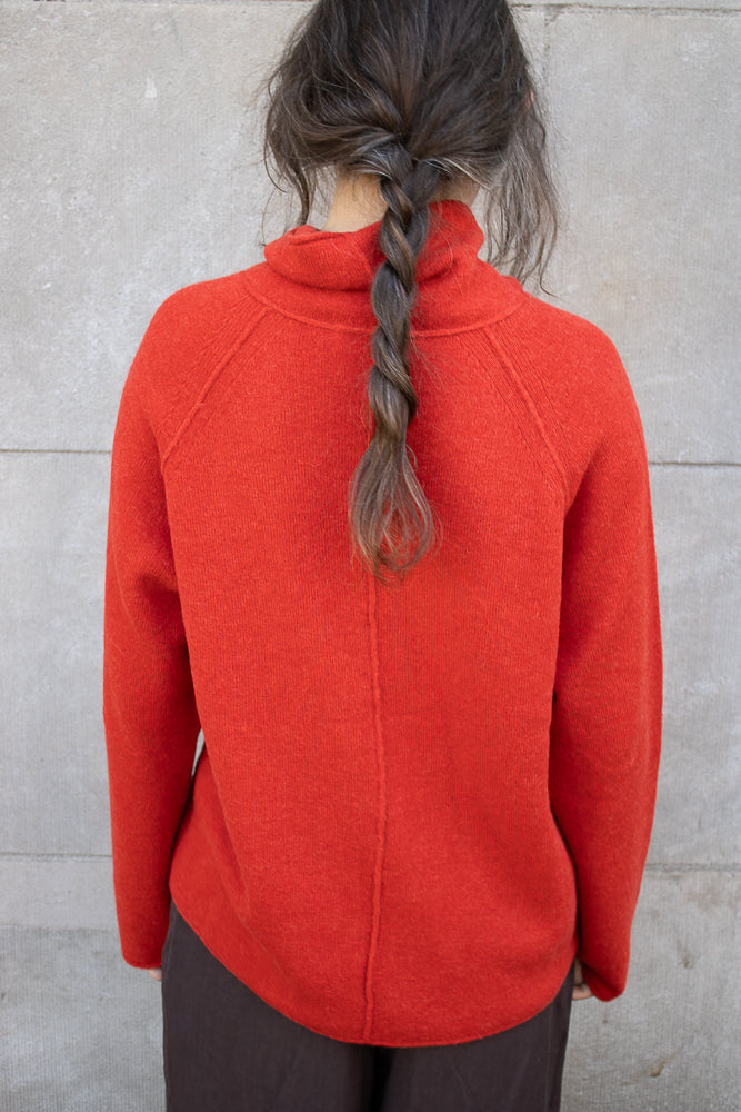 Casey Casey High Neck Jumper in Sangerine
